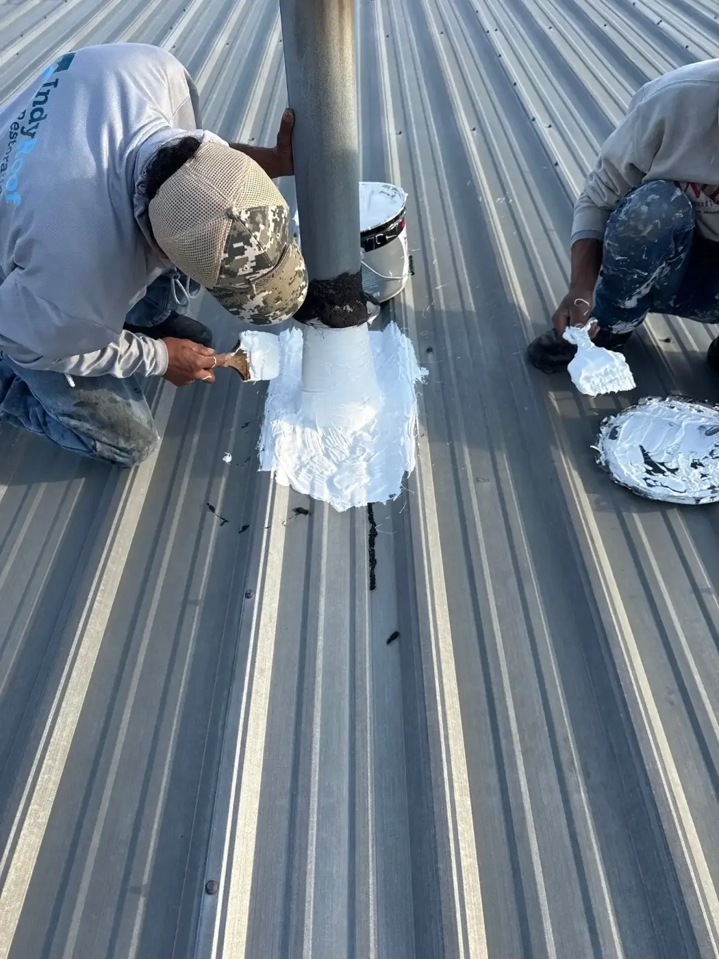 Tarping and dry-in on a Danville commercial roof